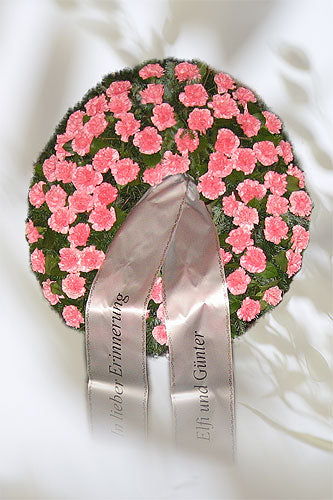 Kranz mit Nelken in rosa inkl. Schleife